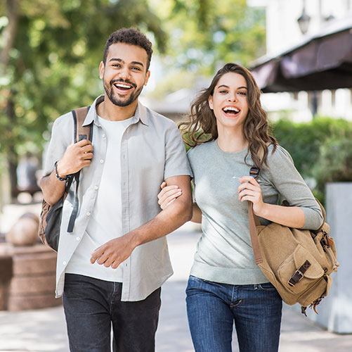 young smiling couple walking